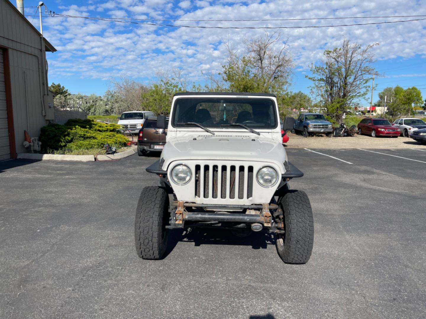 1997 Jeep Wrangler Sport (1J4FY19S4VP) with an 4.0L L6 OHV 12V engine, 5spd Manual transmission, located at 813 E Fairview Ave, Meridian , ID, 83642, (208) 336-8230, 43.618851, -116.384010 - Photo#3